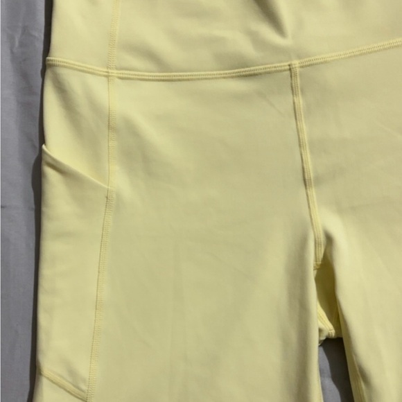 Fabletics Pure Luxe High Waisted Pastel Yellow Bike Shorts 6” - Picture 5 of 6